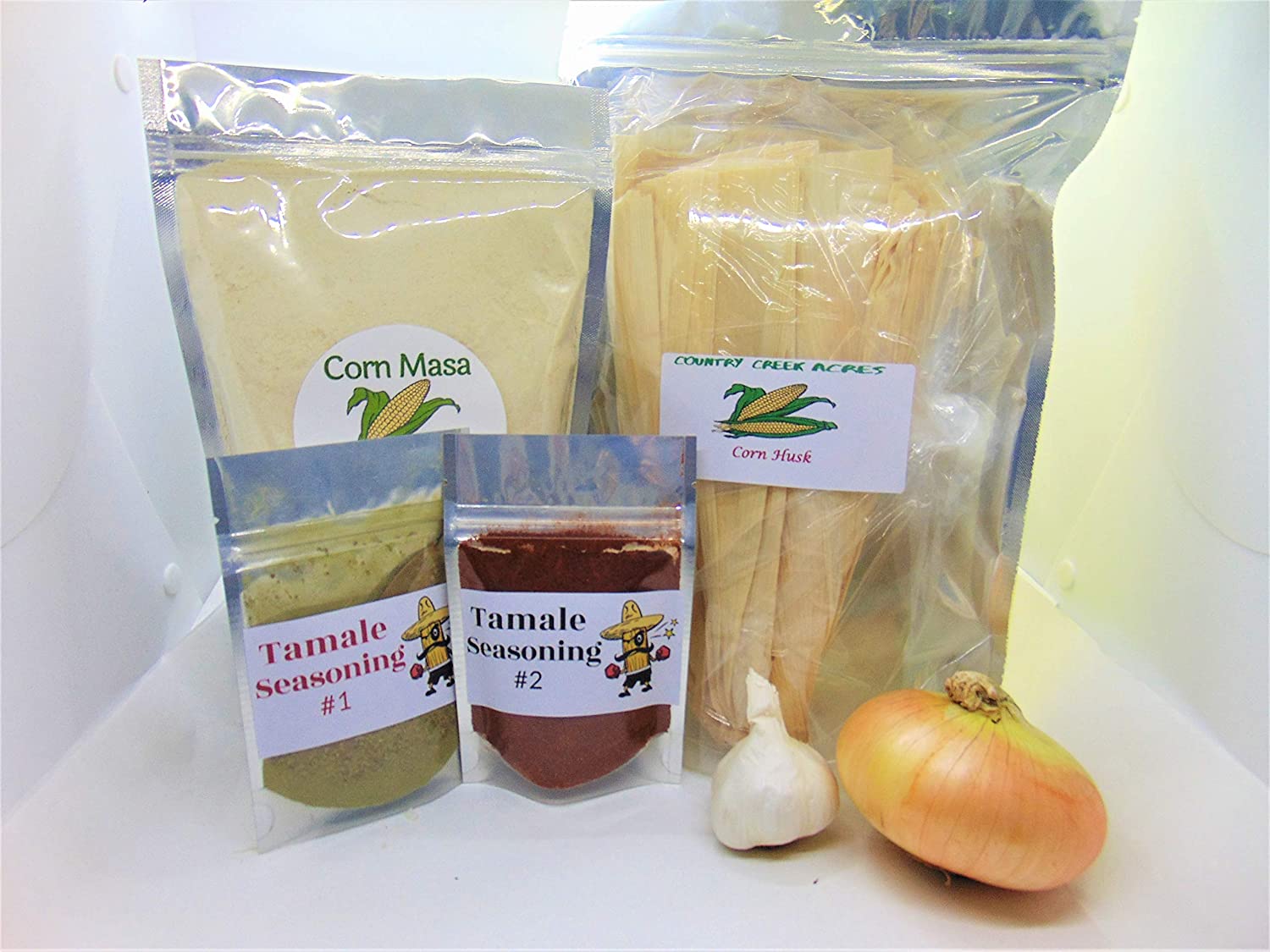 Tamale Kit- Includes 2 Seasoning Packs, 25 Corn Husks, Corn Masa, 1 Onion,  1 Garlic Bulb (Makes 2 Dozen Tamales). Great for Any Occasion. - Country